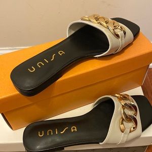 Womens cream colored Unisa sandals